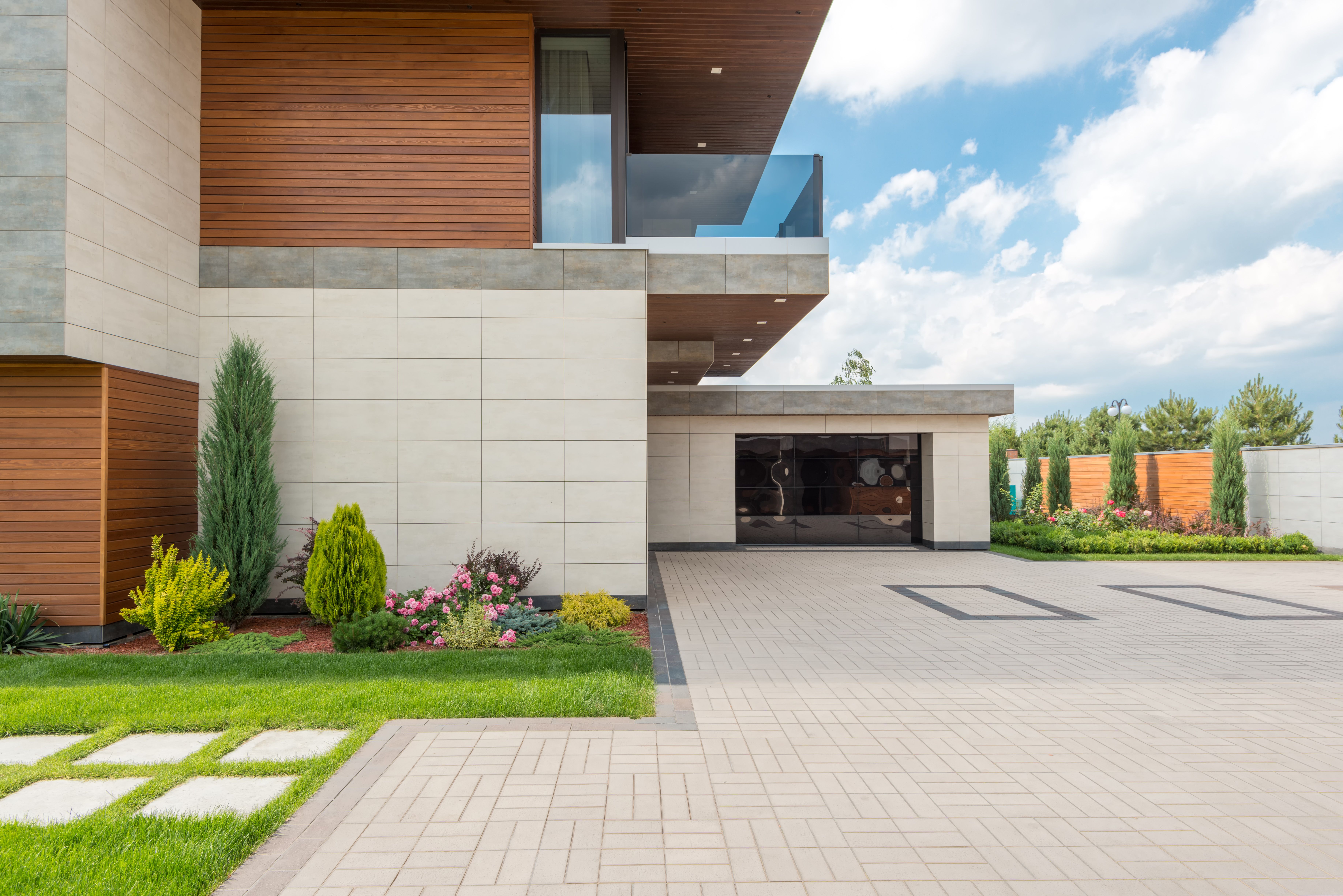Paver patio with stone retaining wall in Edmonton
