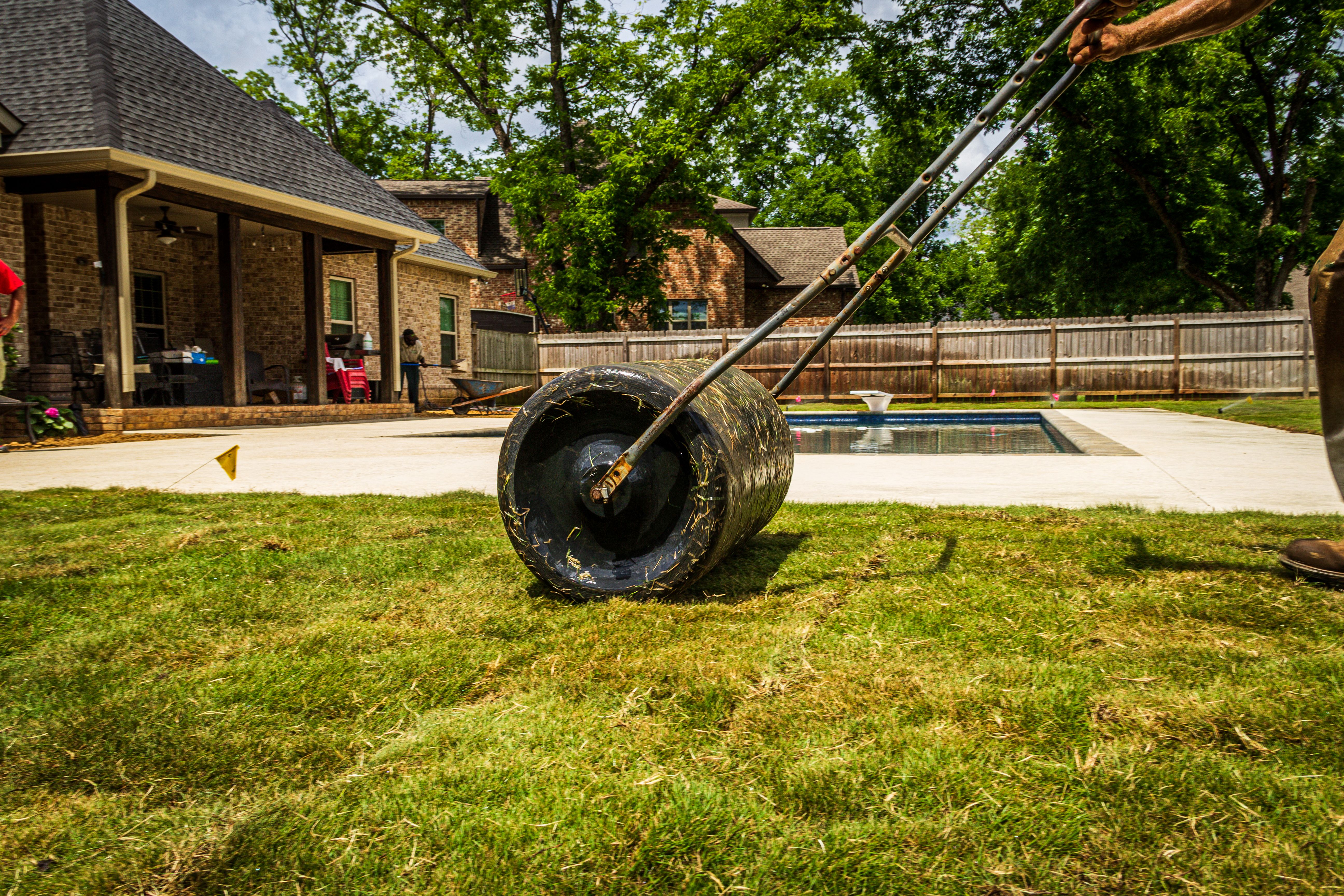Fresh sod being installed on an Edmonton residential property
